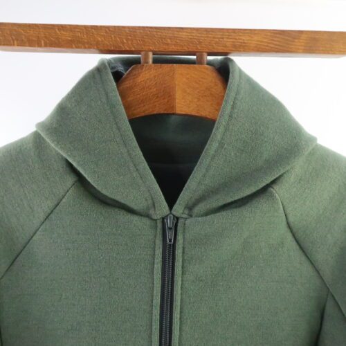 Unisex Adult Half Zip. Merino Wool. Sweater with a zipper that comes about halfway down the length of the shirt. . Colour is olive green