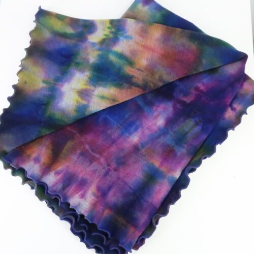 Blanket. Merino Wool. Multi coloured rainbow colour with ruffled edge.